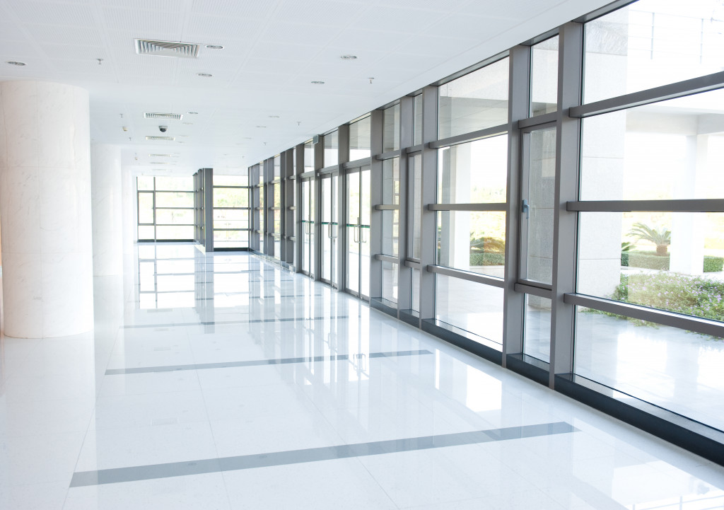 Empty long corridor in the modern office building