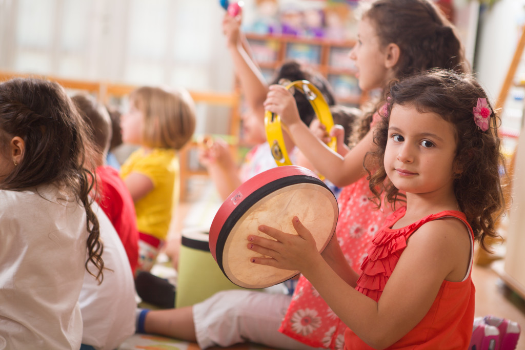 young children learning instruments