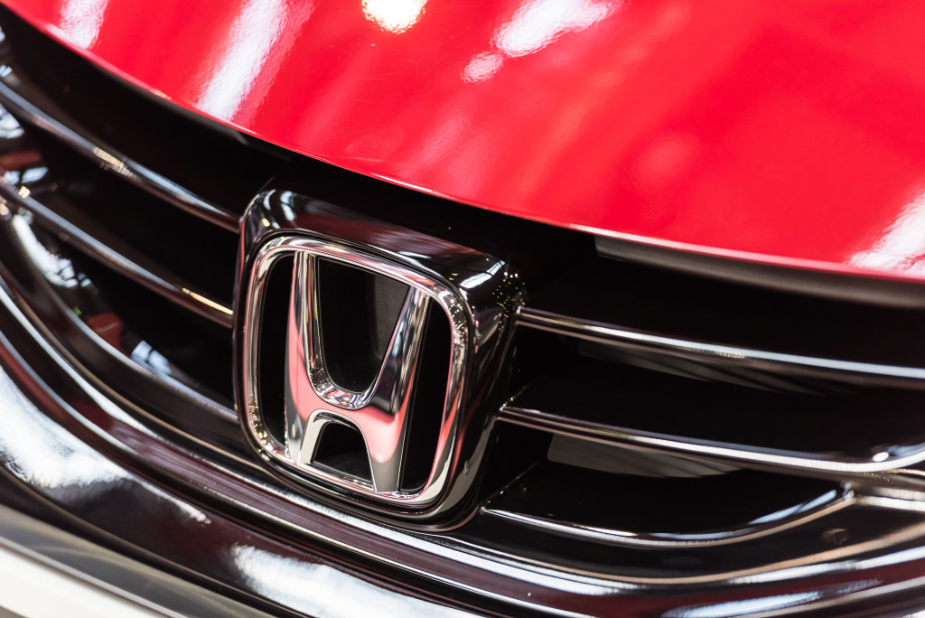Honda logo in front of the car
